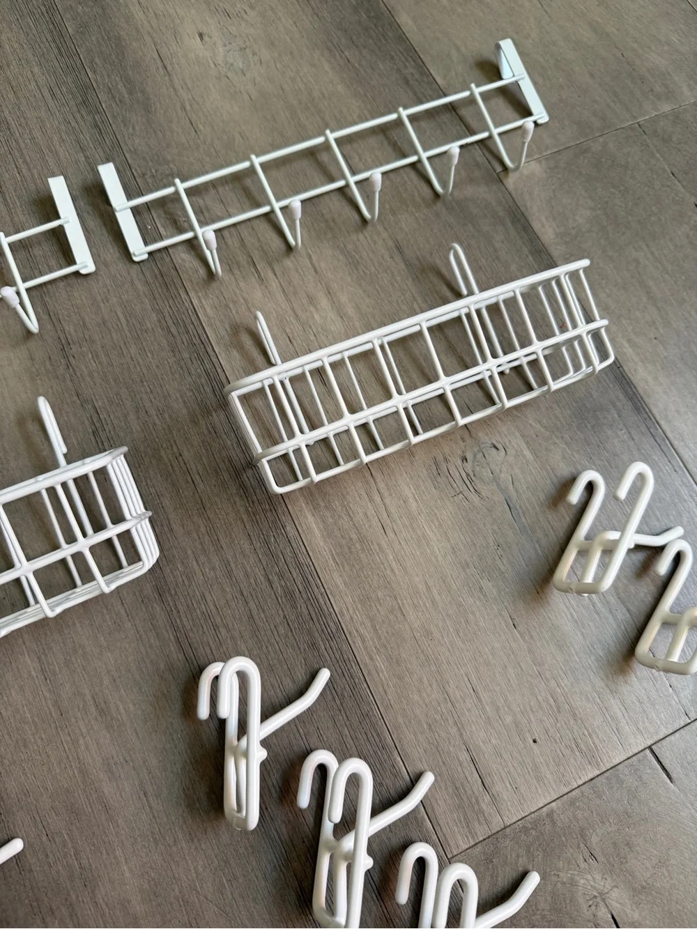 White baskets and hooks